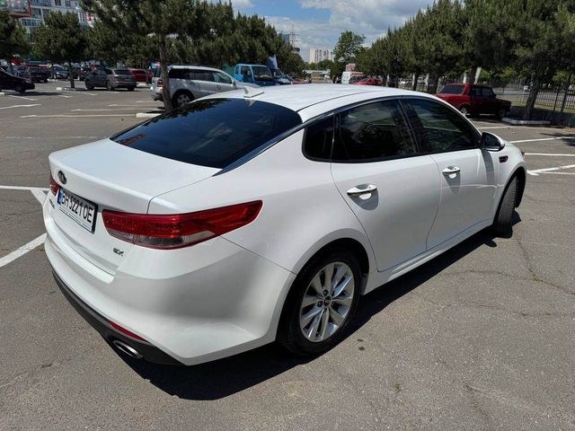 Kia Optima - фото 5