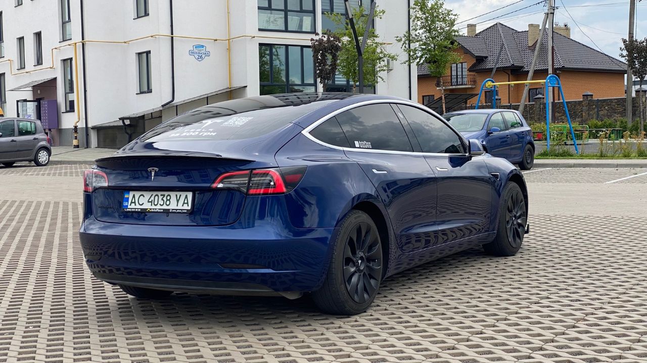 Tesla Model 3 - фото 12