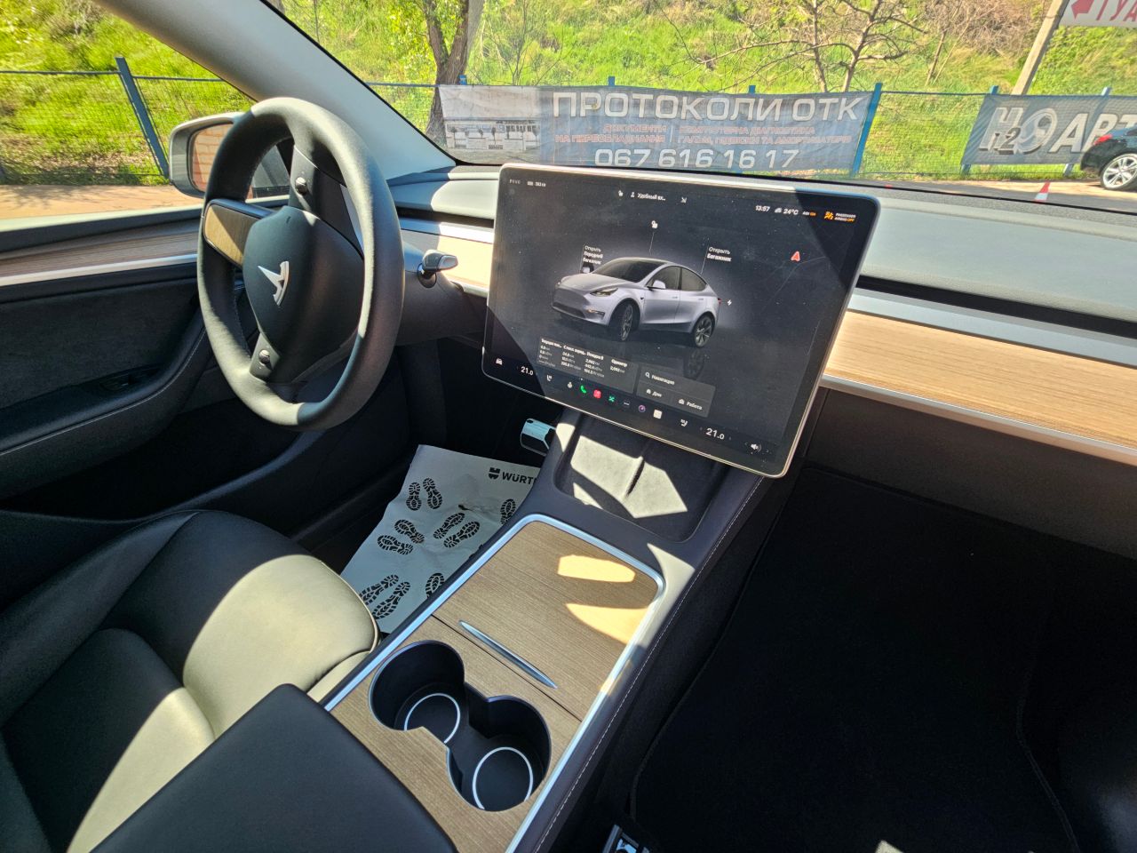 Tesla Model Y - фото 12