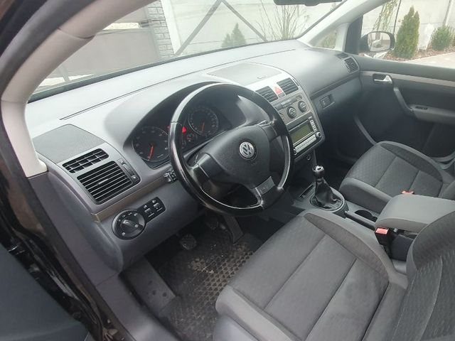 Volkswagen Touran - фото 5
