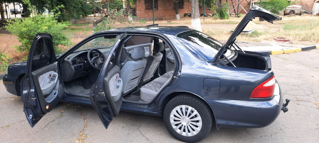 Kia Clarus - фото 4