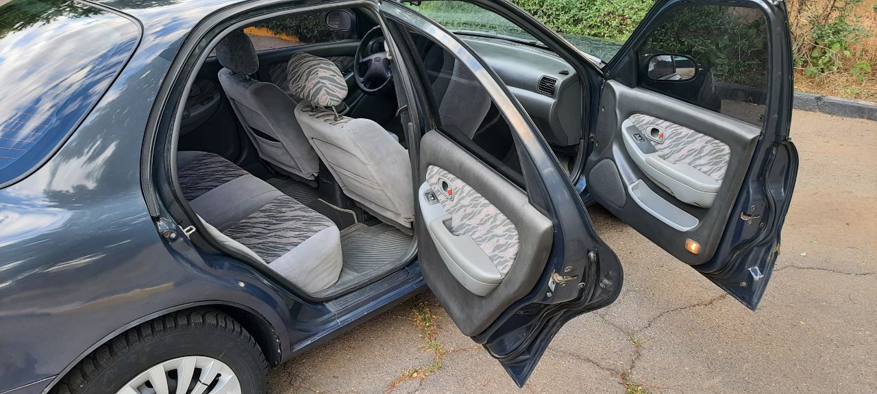 Kia Clarus - фото 8