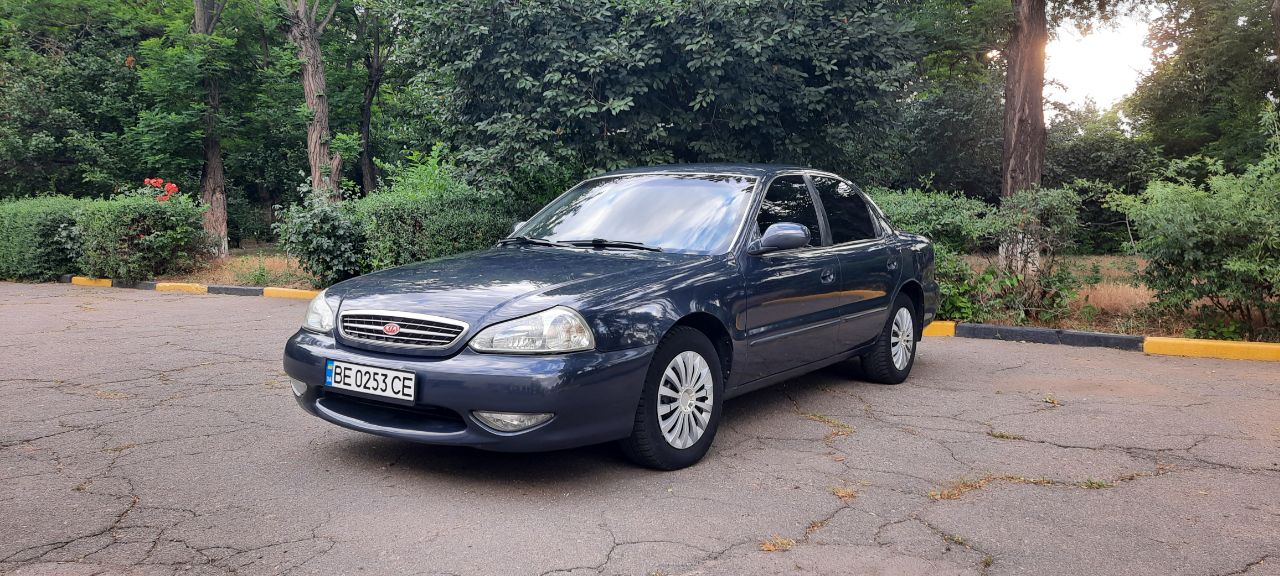 Kia Clarus - фото 16