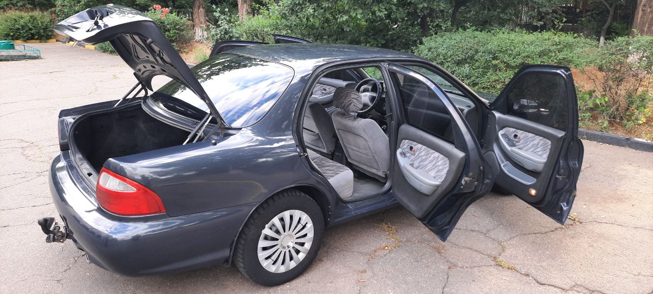 Kia Clarus - фото 3