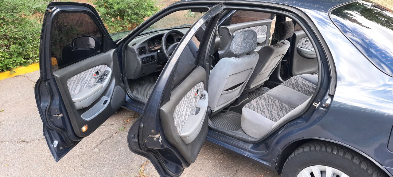 Kia Clarus - фото 6