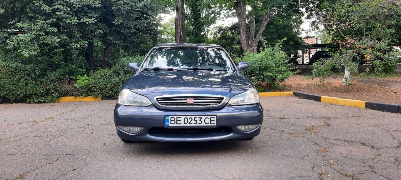 Kia Clarus - фото 15