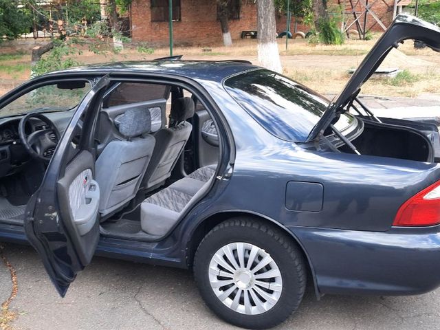 Kia Clarus - фото 4