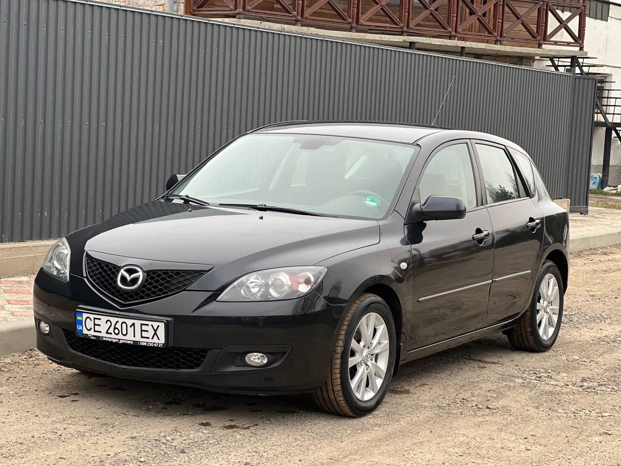 Mazda 3 - фото 1