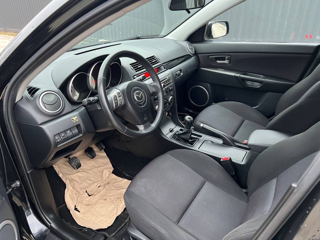 Mazda 3 - фото 10