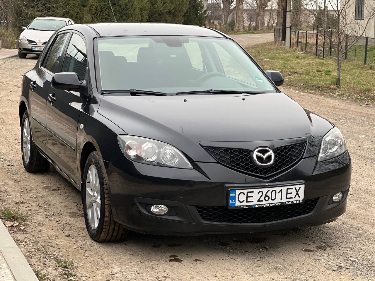 Mazda 3 - фото 5