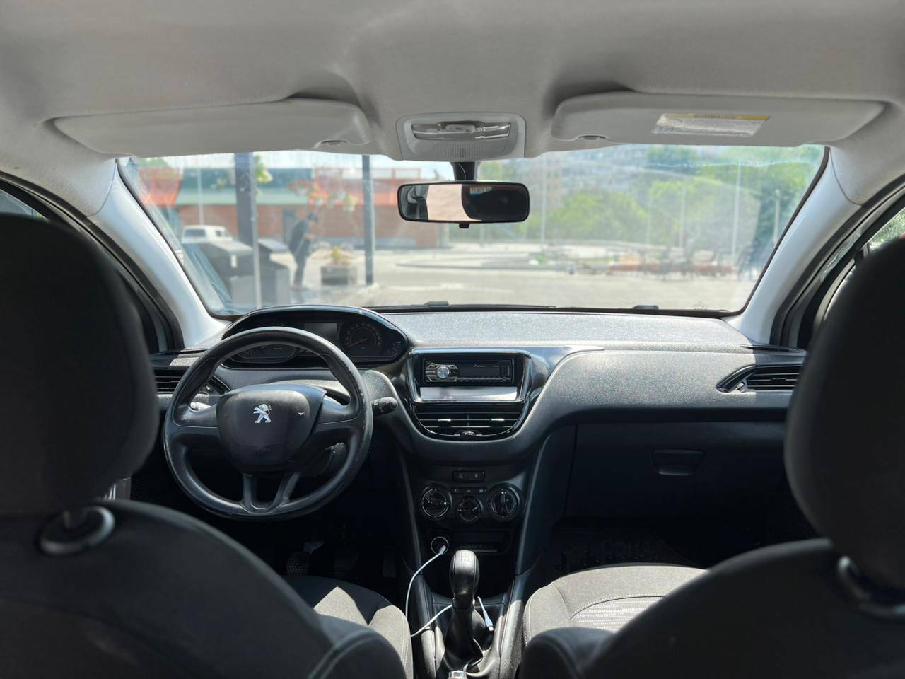 Peugeot 208 - фото 6