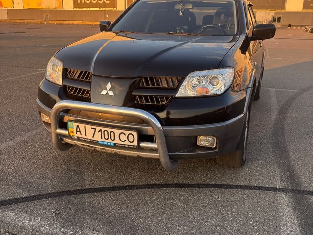 Mitsubishi Outlander - фото 2