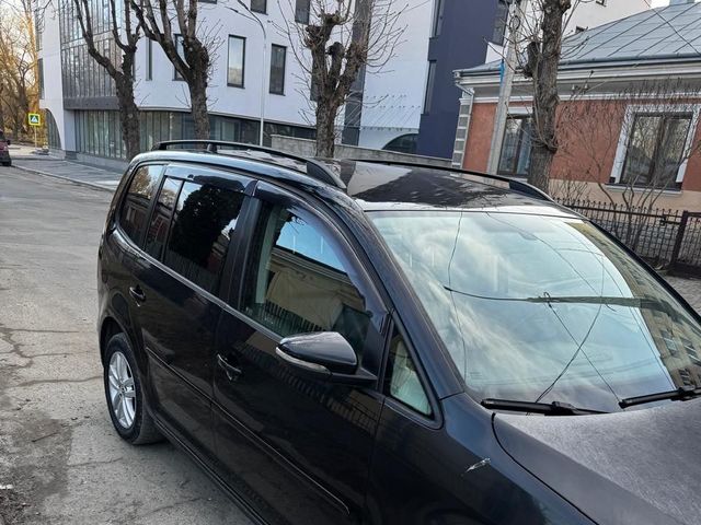 Volkswagen Touran - фото 2