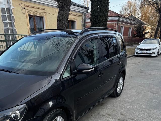 Volkswagen Touran - фото 4
