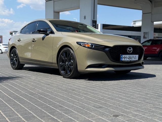 Mazda 3 - фото 2