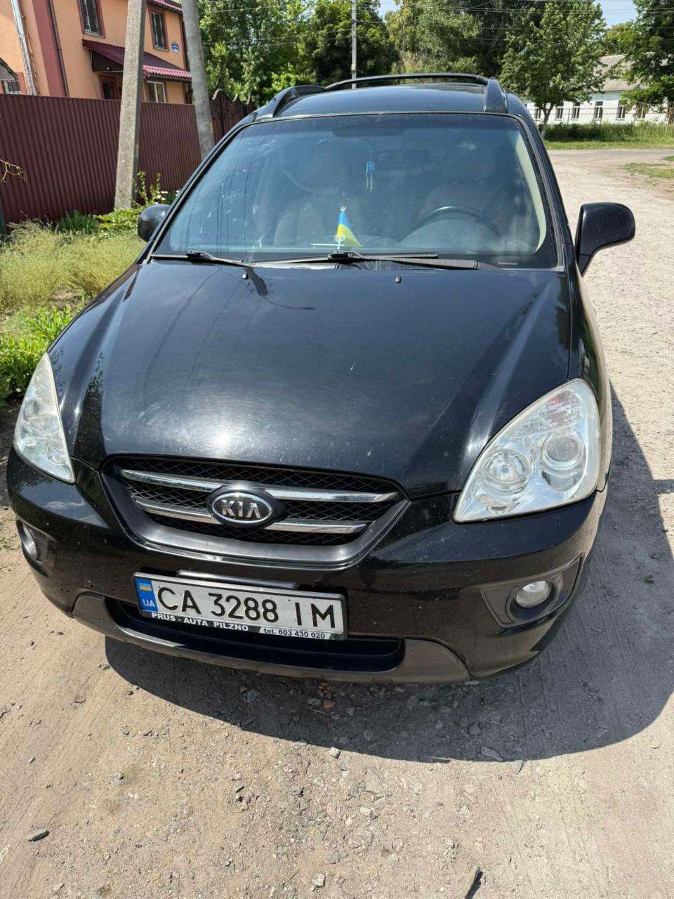 Kia Carens - фото 9