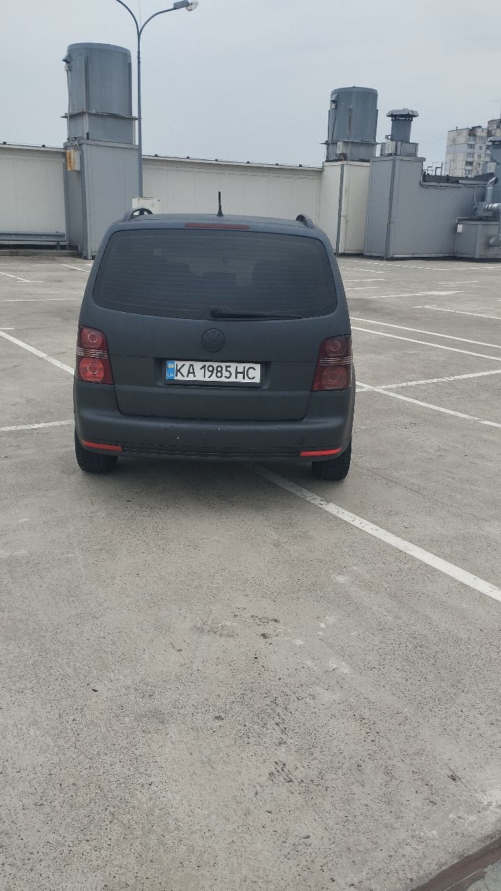 Volkswagen Touran - фото 5