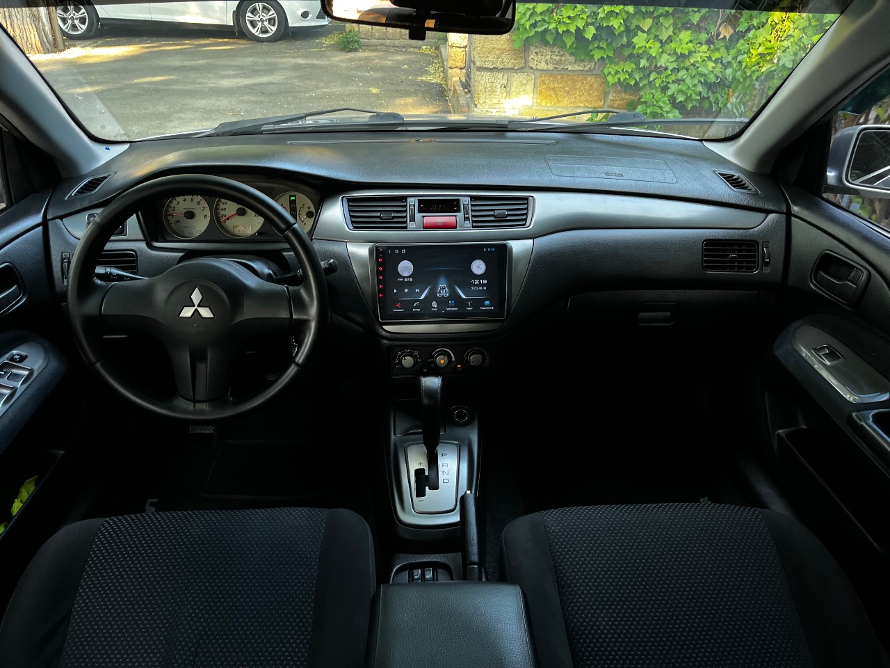 Mitsubishi Lancer - фото 20