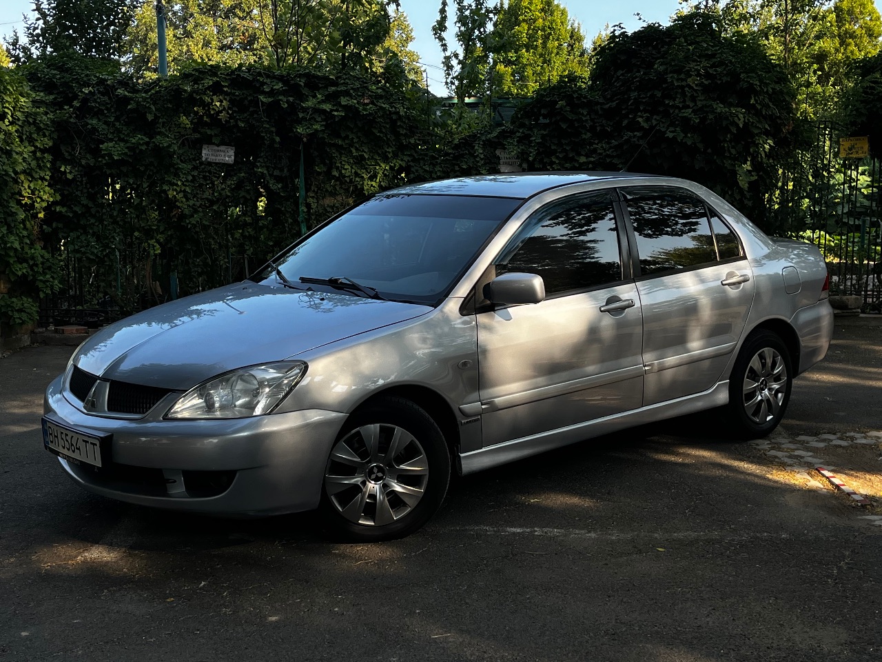 Mitsubishi Lancer - фото 1