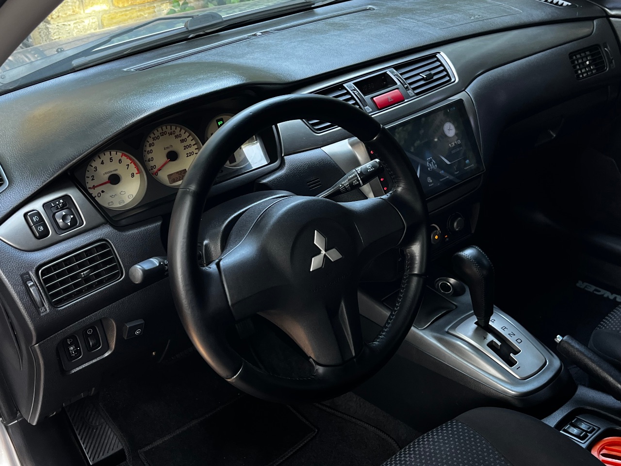 Mitsubishi Lancer - фото 11